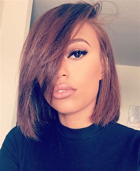 This black layered bob hairstyle is perfectly cut in line with the jawline and a softly structured wave added to the. Side part bob with bangs wigs for black women african ...