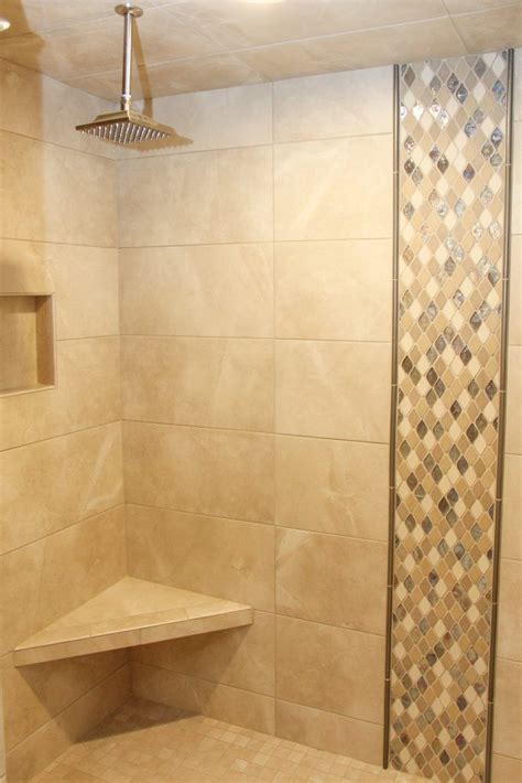 With over 10 years of experience, he specializes in bathroom and kitchen renovations. Beige Tile Shower Walls and Floor: Beige and Iridescent ...
