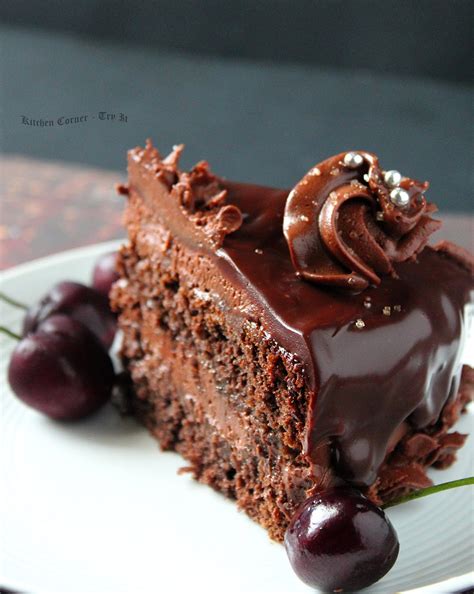 Soft and moist chocolate cake layer topped with super creamy chocolate mousse and soft chocolate ganache. Chocolate Mousse Cake With Ganache Frosting