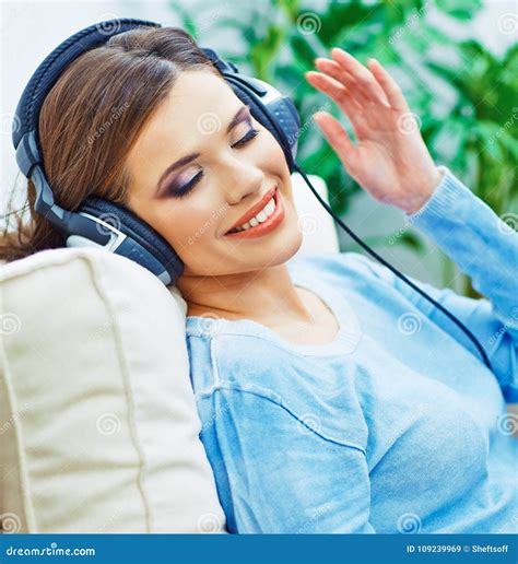 Happy Smiling Woman Listening Music With Headphones Stock Image