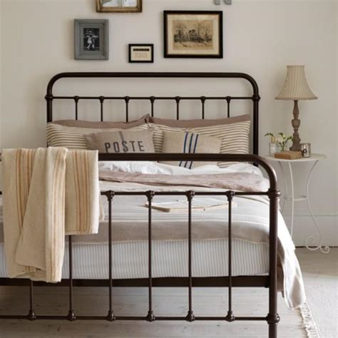 The wrought iron bed frame. 10 Gorgeous Basic Iron Bed Design Ideas For Vintage Charm ...