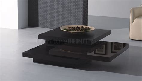 dark brown contemporary coffee table  rotating table panels