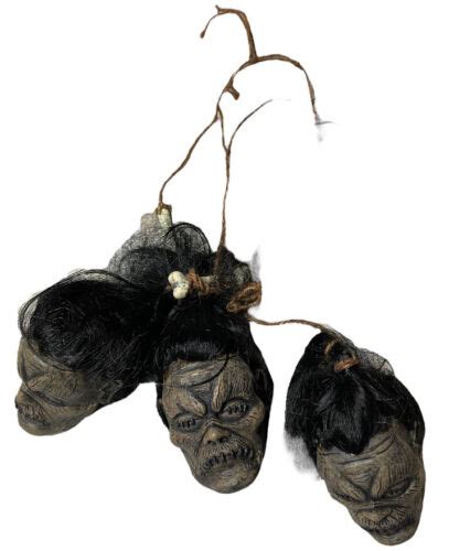 Set Of 3 Reproduction Shrunken Heads Resin With Real Hair Hanging Chip
