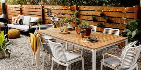 This set includes four dining chairs and a dining table. Kinsey Outdoor Dining Table | Joybird