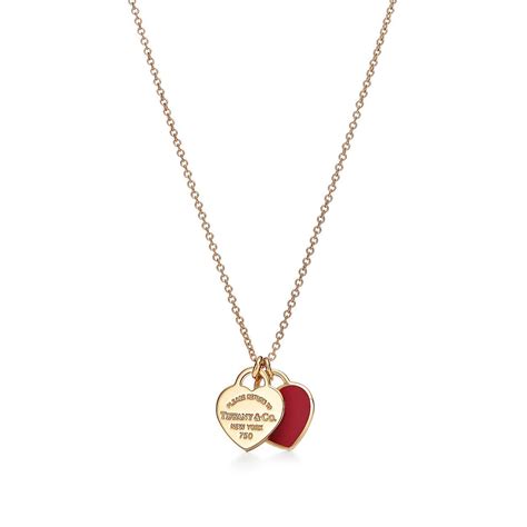 Return To Tiffany® Mini Double Heart Tag Pendant in 18K Gold in 2021