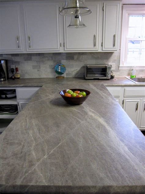 Soapstone varies in color a little bit, but you can expect to find it mostly dark grey, green, black, or blue. Break it down now! … Our Kitchen Remodel Costs ...