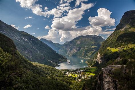 4k 5k Geiranger Fjord Norway Mountains Sky Scenery Bay Clouds