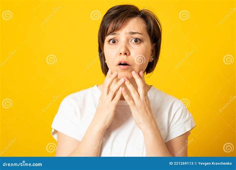 surprise astonished woman portrait woman looking surprised in full disbelief wide open mouth