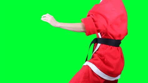 Beautiful Girl In Santa Claus Clothes And Red Gloves Makes Karate Punch Png Alpha Stock Footage