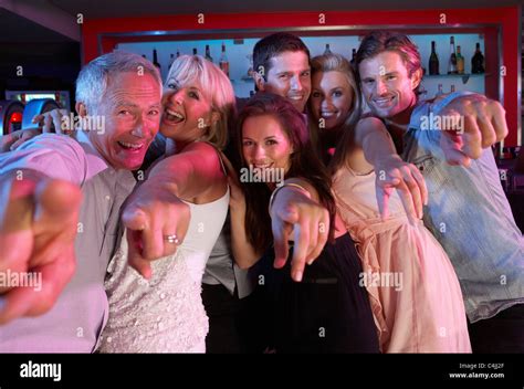 Group Of People Having Fun In Busy Bar Stock Photo Alamy