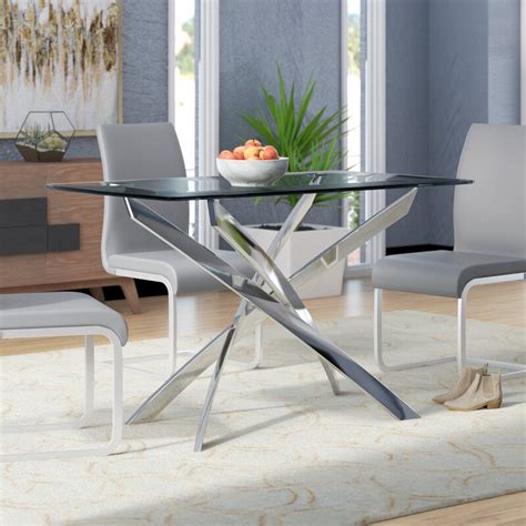 Kitchen tables and more first opened the doors to its columbus, ohio, furniture store in 1979, guided by a vision of creating a place that would be anchored by a literal kitchen table, a furniture piece that we believe unifies a home and creates countless family memories. Wade Logan® Coraline Glass Top Modern Dining Table ...