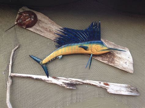 Beautiful carved 60cm solid suar wood sailfish/marlin big game fish sculpture quality wood carving to grace any home or room in the house. Check out next sailfish carving by thesawdog www.thesawdog ...