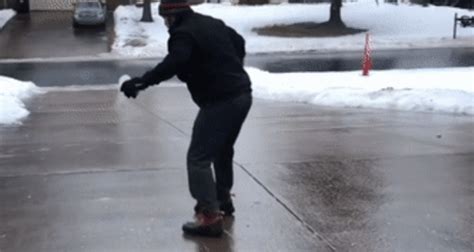 Slip N Salt Man Slides Down Icy Minnesota Driveway