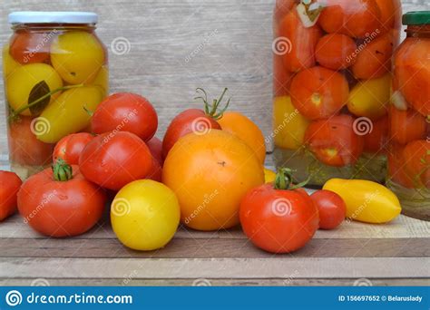 Jar Of Pickled Small Red And Yellow Cherry Tomatoes Fresh Tomatoes