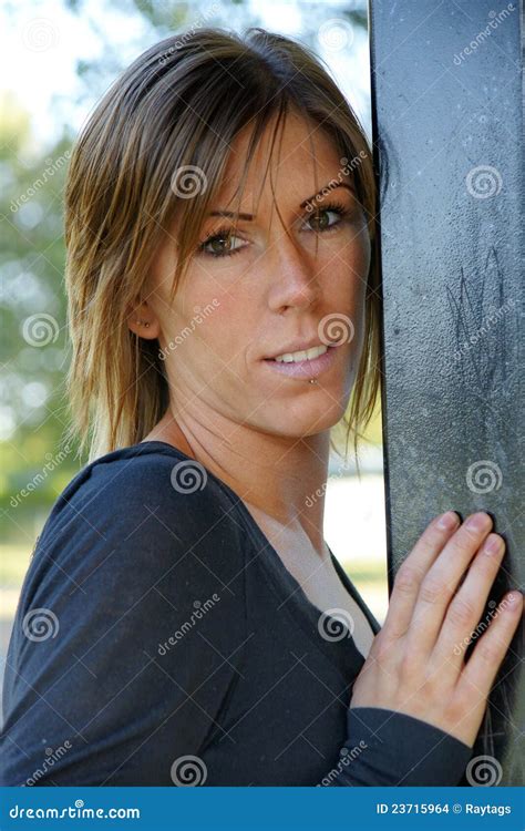 Confident Looking Woman Posing In Front Of Camera Stock Images Image