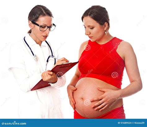 Doctor Gynecologist Giving Consultation To A Young Pregnant Woman Royalty Free Stock Image