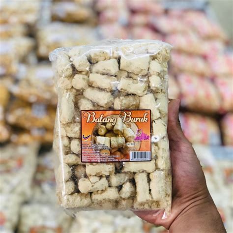 Kerana kuih batang buruk, seorang atuk dan dua cucunya telah mula mengenali tentang cinta. kuih batang buruk/kayu buruk PREMIUM QUALITY/Gred B ...