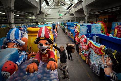 Germans Eager To See Whose Parade A Carnival Float Will Rain On The