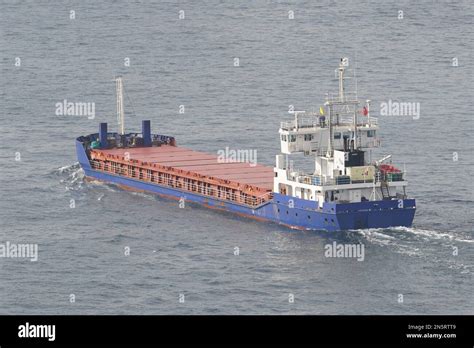 A Cargo Ship Carrying Goods Between Ports Stock Photo Alamy