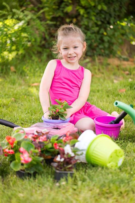 Little Girl Planting Flowers Stock Photo Image Of Female