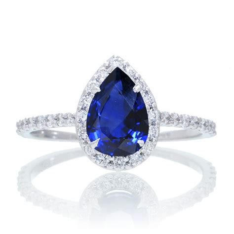 This vintage cartier engagement ring incorporates diamonds, sapphires and flower petals for a truly unique ring! 1.5 Carat Classic Pear Cut Sapphire With Diamond Celebrity Engagement Ring on 10k White Gold ...