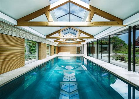 Make it as real as possible with your decoration skills. Contemporary pool house by Re-Format combines stone ...