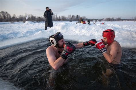 Swimming In Ice In Russia Abs Cbn News