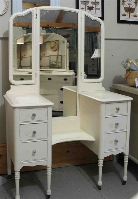 Choosing just the right mirror to complement a bathroom vanity takes careful consideration. Vintage drop-well vanity. A 1930s dressing table, painted ...