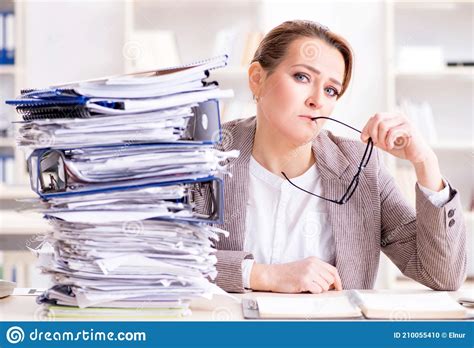 Businesswoman Very Busy With Ongoing Paperwork Stock Photo Image Of