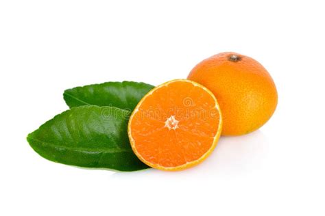 Whole And Cut Ripe Orange With Leaf On White Background Stock Image