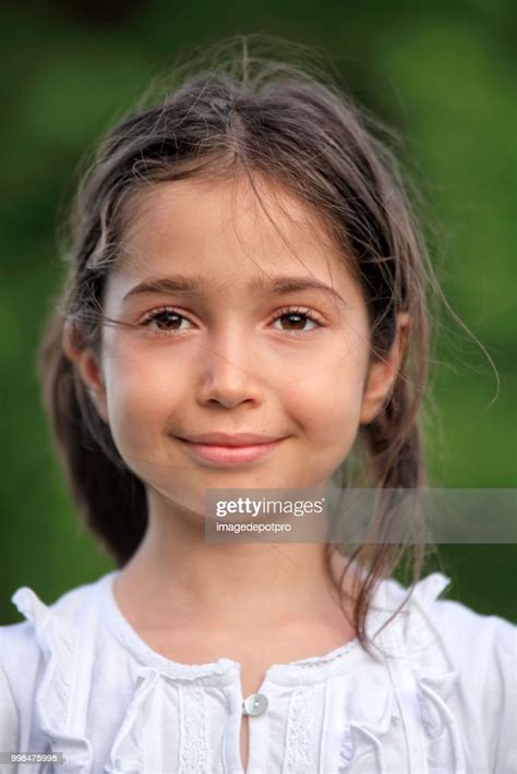 Close Up Portrait Of Happy Little Girl High Res Stock Photo Getty Images