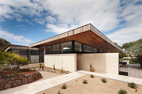 Rammed Earth And Timber Feature Throughout This Australian House