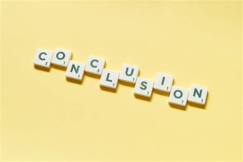 Premium Photo Conclusion Formed Of Scrabble Tiles On Yellow Background