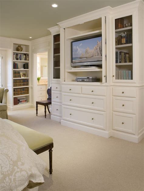 This bedroom decorating idea is chic and modern and involves a geometric wallpaper in a grey palette, which lends a trendy touch to the bedroom. Master Bedroom Tv Cabinet Home Design Ideas, Pictures ...