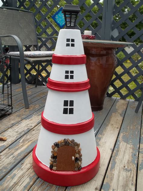 Lighthouse Made Out Of Terra Cotta Pots With Solar Light