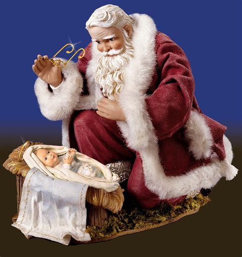 Santa Kneeling At The Manger Figurine A Timeless Christmas Tradition