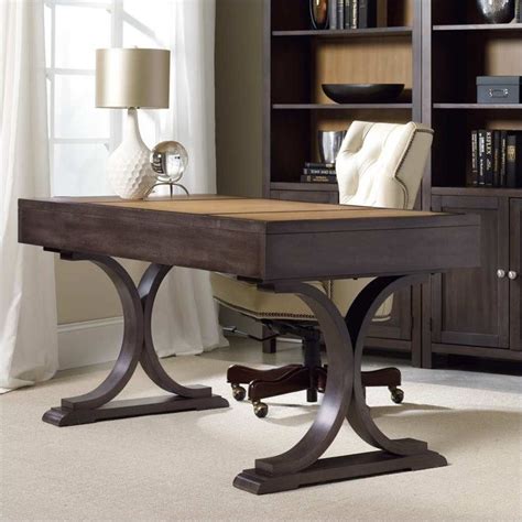 The bow front design impresses while encouraging placement in the middle of an office or room. South Park 60 Inch Writing Desk - 5078-10458