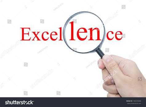 Hand Showing Excellence Word Through Magnifying Stock Photo 184039688