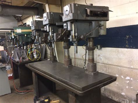 This type of drill is a relatively newer drill that combines an impact driver with a cordless drill. Clausing 3 Head Drill Press with Cat Stand - BTM Industrial