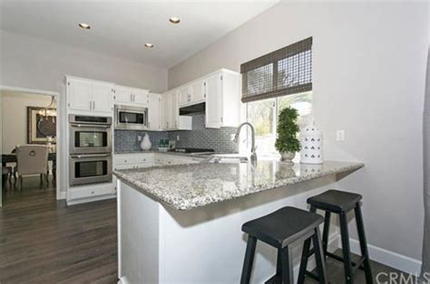 You need to reserve space for working on the counter and backsplash — this should. How tall should my kitchen cabinets be?