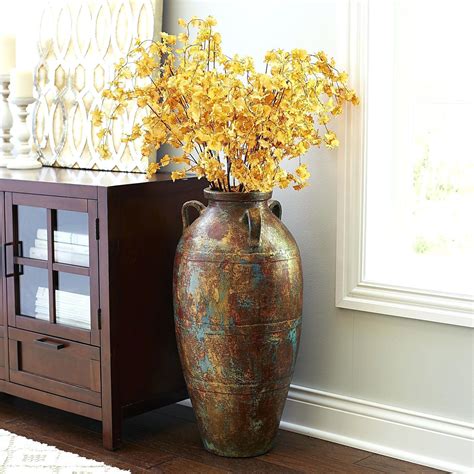 I placed each one in a tall glass, spread the branches apart, and spritzed with water the buds that seemed a little smashed. 30 Popular Tall Vase for Bamboo | Decorative vase Ideas