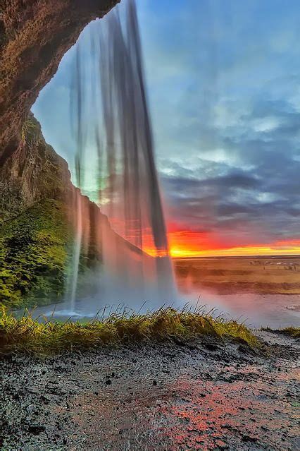 Inside The Great Seljalandsfoss Falls At Sunset South Iceland By