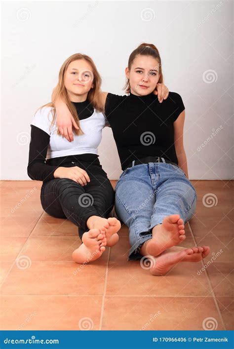 Soles Of Bare Feet Of Teenage Girls Royalty Free Stock Photo