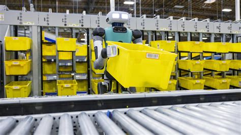 Amazon Revamps Warehouses With Robots To Reduce Delivery Times