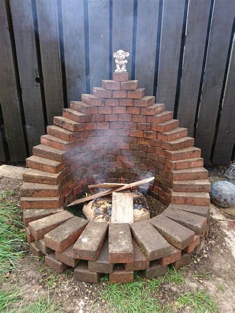 Diy brick paver fire pit. I made a fire pit from the garden paver path #Firepitideas ...