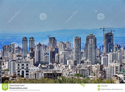 Skyscrapers On Hillside And Mountains In Distance Tehran
