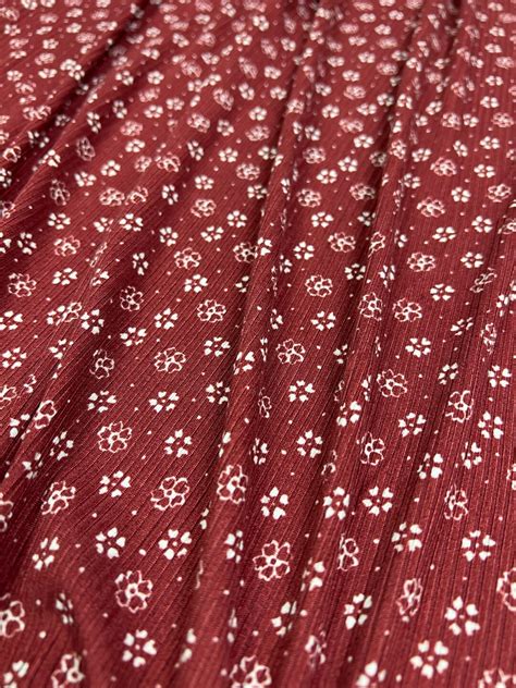 Ribbed Knit Fabric White Ditsy Floral W Burgundy Base 4x2 Rib Poly
