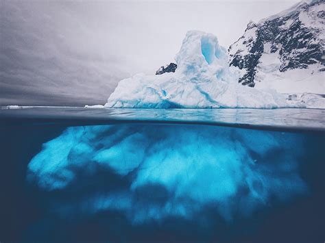 An Iceberg From Above And Below From The Antarctica Peninsula Oc