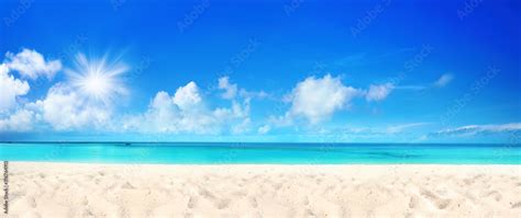Beautiful Beach With White Sand Turquoise Ocean Water And Blue Sky