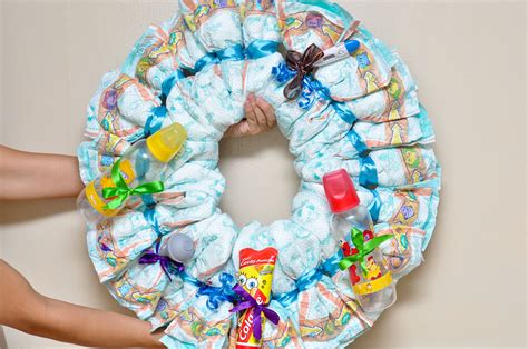Do your best to find items that are. How to Make a Diaper Wreath | Diaper wreath, Baby shower ...